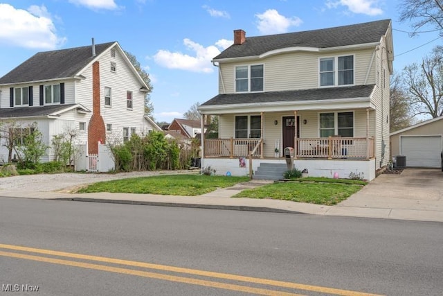 traditional home featuring central AC, an outdoor structure, a porch, a chimney, and a garage