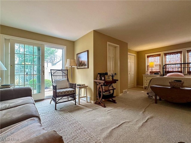 835 John St, Niles, OH 44446 - living area featuring visible vents, baseboards, and carpet floors