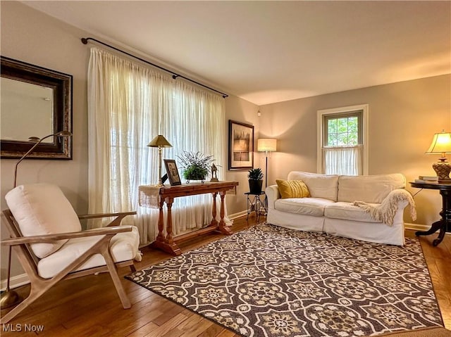 835 John St, Niles, OH 44446 - living room featuring baseboards and wood finished floors