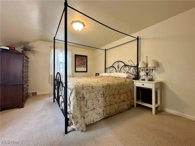 835 John St, Niles, OH 44446 - carpeted bedroom with visible vents, baseboards, and vaulted ceiling