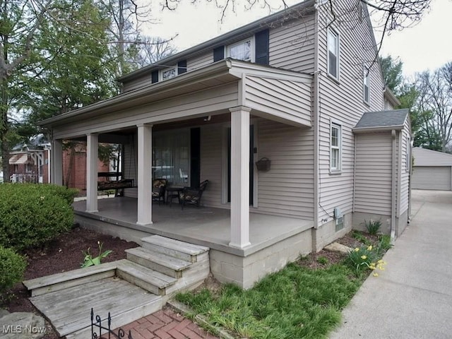 835 John St, Niles, OH 44446 - exterior space featuring a porch and an outbuilding