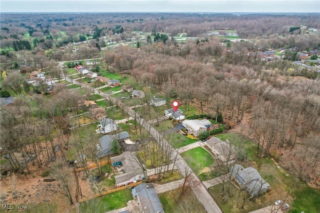 aerial view with a wooded view