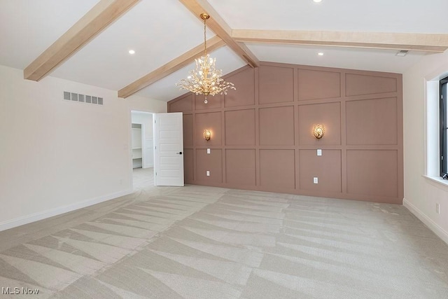 2762 Rocky Ridge Dr, Westlake, OH 44145 - unfurnished living room with a notable chandelier, lofted ceiling with beams, light carpet, visible vents, and a decorative wall