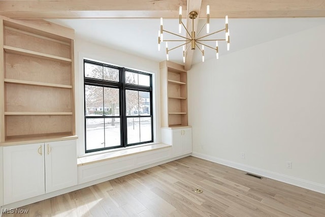 2762 Rocky Ridge Dr, Westlake, OH 44145 - unfurnished dining area with beamed ceiling, visible vents, light wood finished floors, baseboards, and a notable chandelier