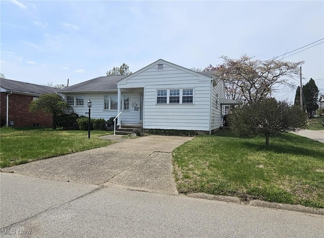3509 11th Ave, Vienna, WV 26105 - view of front of house featuring a front yard and driveway