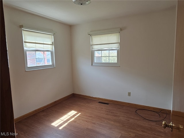3509 11th Ave, Vienna, WV 26105 - unfurnished room with visible vents, baseboards, and wood finished floors