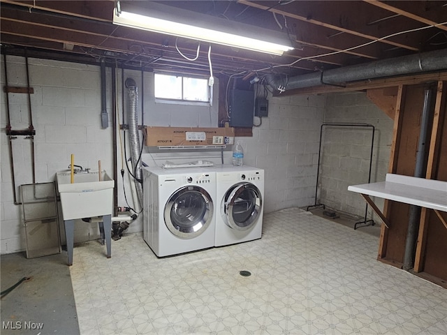 3509 11th Ave, Vienna, WV 26105 - laundry room featuring laundry area, separate washer and dryer, a sink, and light floors