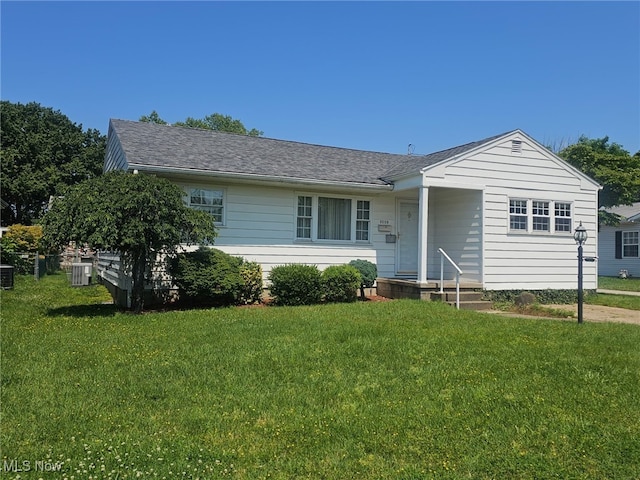 3509 11th Ave, Vienna, WV 26105 - ranch-style home with a front yard and roof with shingles