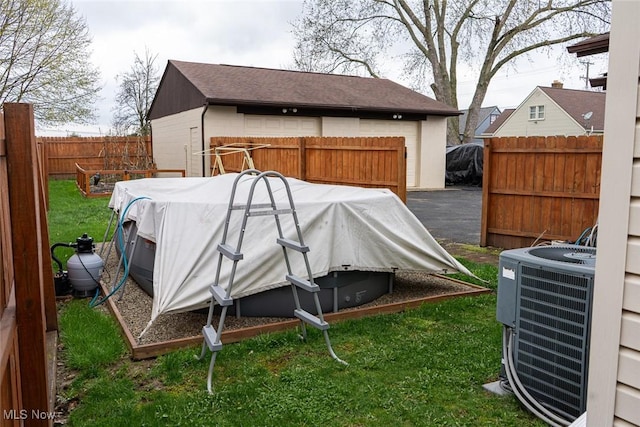 1313 Linwood Ave SW, Canton, OH 44710 - view of outbuilding with cooling unit and a fenced backyard