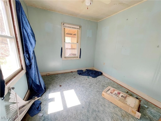 276 Drain St, East Liverpool, OH 43920 - carpeted spare room featuring crown molding, baseboards, and ceiling fan