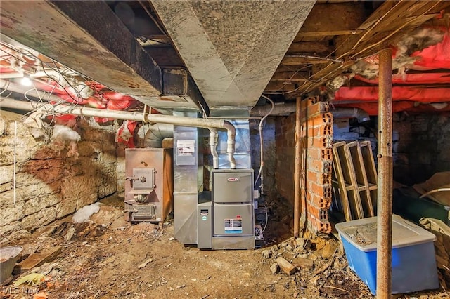 unfinished below grade area featuring heating unit
