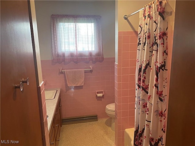 301 E Howard St, Girard, OH 44420 - bathroom featuring toilet, vanity, wainscoting, and tile walls