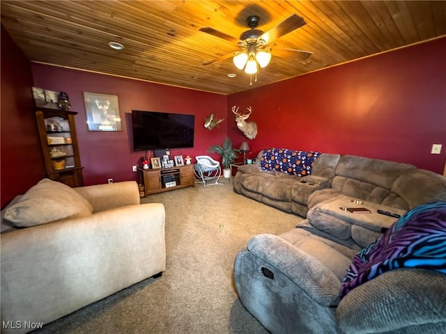 carpeted living room featuring wooden ceiling and a ceiling fan