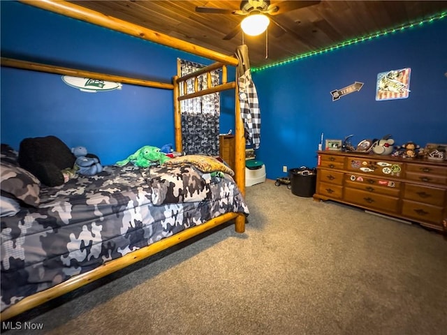 carpeted bedroom featuring wood ceiling