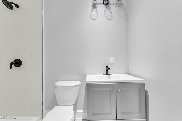 1244 W 69th St, Cleveland, OH 44102 - full bath featuring toilet, tiled shower, and vanity