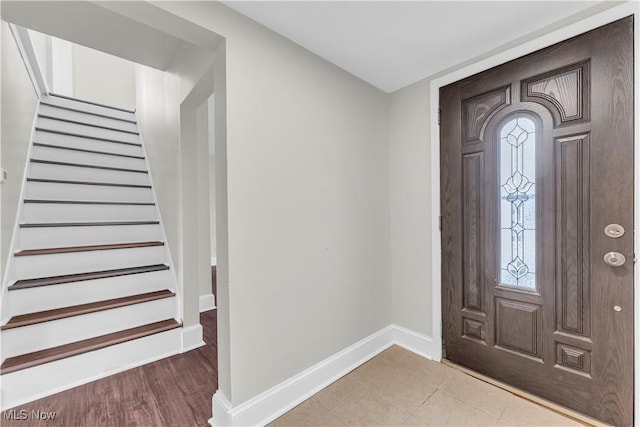 1244 W 69th St, Cleveland, OH 44102 - foyer featuring a wealth of natural light, stairway, and baseboards