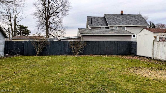 view of yard featuring a fenced backyard