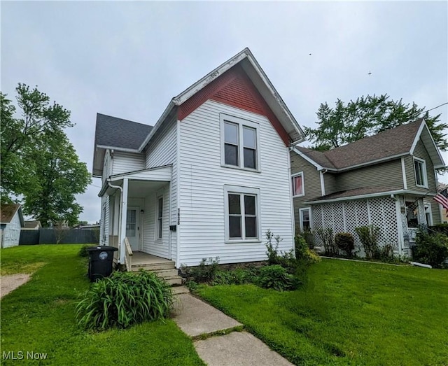 1636 W 8th St, Ashtabula, OH 44004 - victorian home featuring a front yard