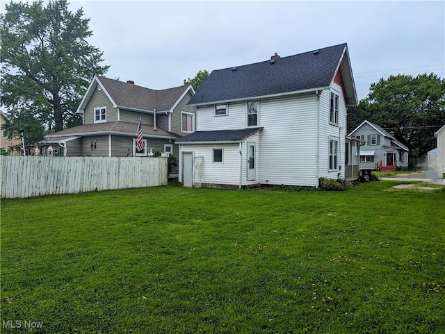 1636 W 8th St, Ashtabula, OH 44004 - back of property featuring entry steps, a chimney, and a shingled roof