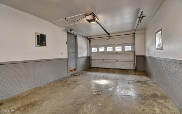 7345 Township Road 319, Millersburg, OH 44654 - garage with a garage door opener and wainscoting