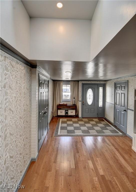 7345 Township Road 319, Millersburg, OH 44654 - entryway with wood finished floors and wallpapered walls
