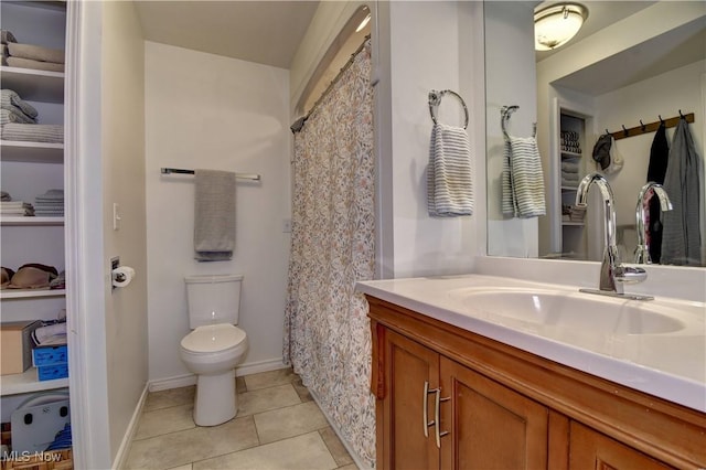 7345 Township Road 319, Millersburg, OH 44654 - bathroom with toilet, vanity, baseboards, and tile patterned flooring