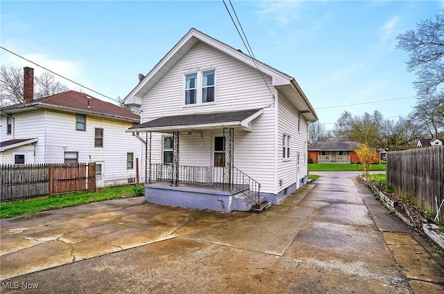 2510 E Midlothian Blvd, Youngstown, OH 44502 - back of house with covered porch, fence, and driveway