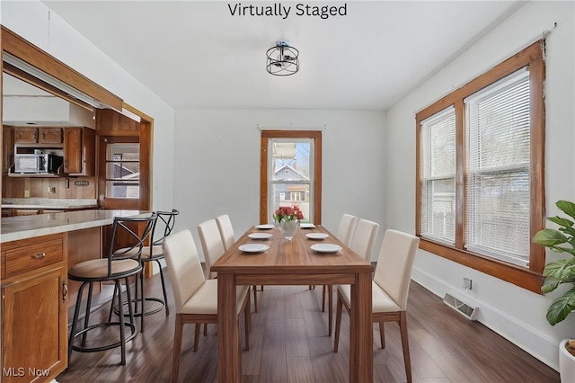 2510 E Midlothian Blvd, Youngstown, OH 44502 - dining area featuring dark wood finished floors