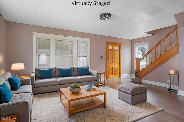 2510 E Midlothian Blvd, Youngstown, OH 44502 - living room featuring wood finished floors, stairs, and baseboards