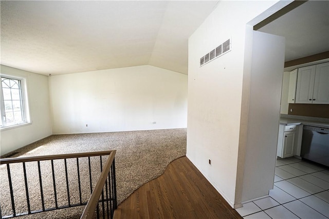 161 Bentwillow Dr, Niles, OH 44446 - interior space featuring visible vents, light wood-style flooring, and lofted ceiling