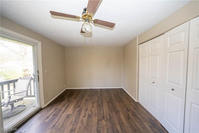 161 Bentwillow Dr, Niles, OH 44446 - unfurnished bedroom featuring access to outside, a closet, baseboards, and dark wood finished floors