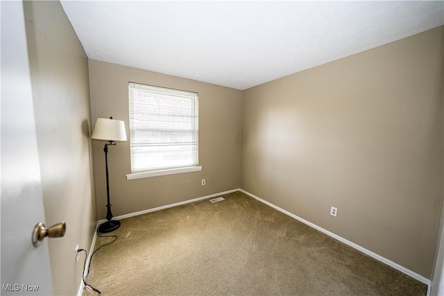 161 Bentwillow Dr, Niles, OH 44446 - spare room featuring visible vents, baseboards, and carpet