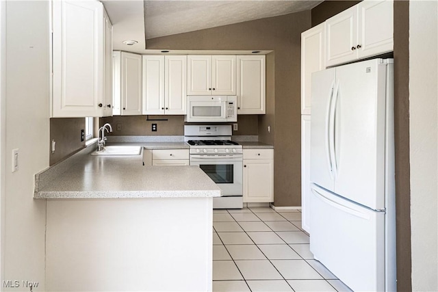 161 Bentwillow Dr, Niles, OH 44446 - kitchen featuring light tile patterned floors, white appliances, white cabinetry, light countertops, and a sink
