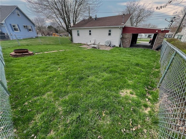 106 N Surry Rd, East Liverpool, OH 43920 - view of yard with a patio area, a fenced backyard, and an outdoor fire pit