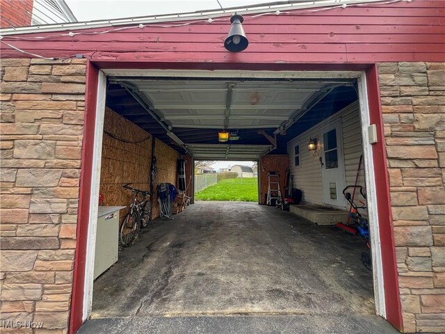 106 N Surry Rd, East Liverpool, OH 43920 - garage with a garage door opener
