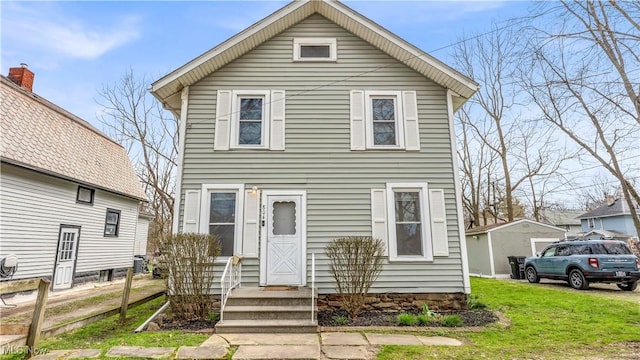 804 E Ave, Elyria, OH 44035 - traditional home featuring a front lawn