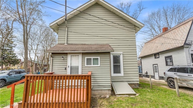 804 E Ave, Elyria, OH 44035 - rear view of house with a yard and a shingled roof