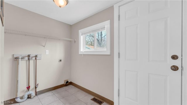 804 E Ave, Elyria, OH 44035 - washroom featuring hookup for an electric dryer, visible vents, laundry area, and baseboards