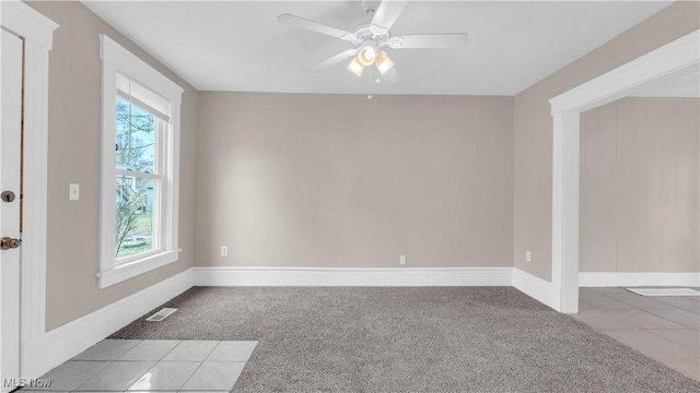 804 E Ave, Elyria, OH 44035 - empty room featuring visible vents, baseboards, a ceiling fan, and carpet flooring