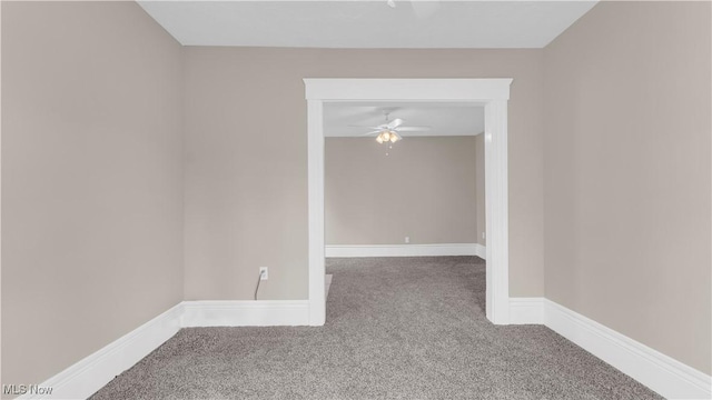 804 E Ave, Elyria, OH 44035 - carpeted spare room featuring baseboards and ceiling fan