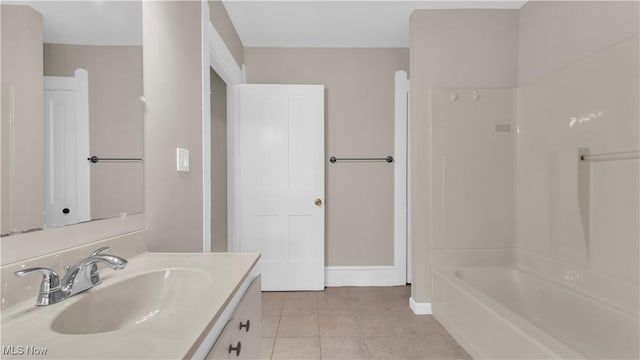 804 E Ave, Elyria, OH 44035 - bathroom with baseboards, tile patterned flooring, shower / bath combination, and vanity