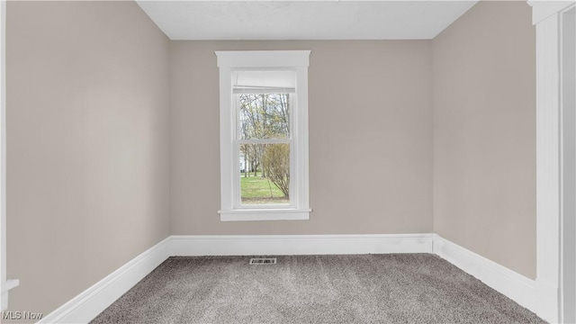 804 E Ave, Elyria, OH 44035 - carpeted empty room featuring visible vents and baseboards