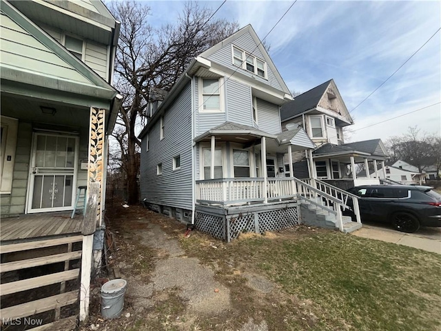 view of front of home featuring covered porch