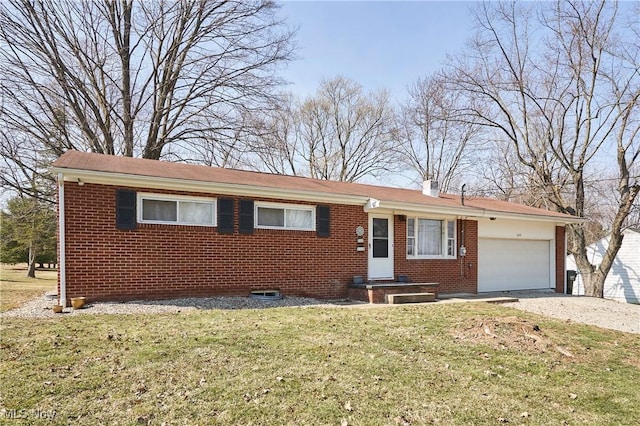 single story home with an attached garage, driveway, brick siding, and a front yard