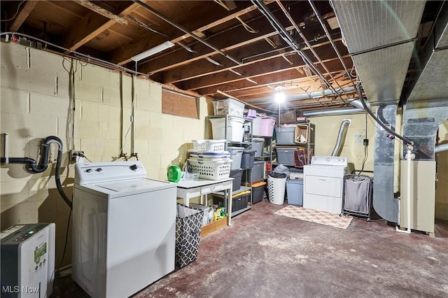 unfinished below grade area with washing machine and dryer