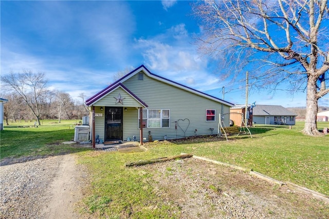 view of front of home with a front yard
