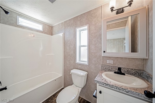 53 Martha Dr, Madison, OH 44057 - full bath with shower / washtub combination, a textured ceiling, vanity, toilet, and wood finished floors