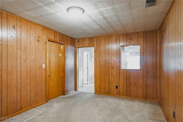 304 Conger Rd, Washington, WV 26181 - empty room featuring wooden walls and carpet