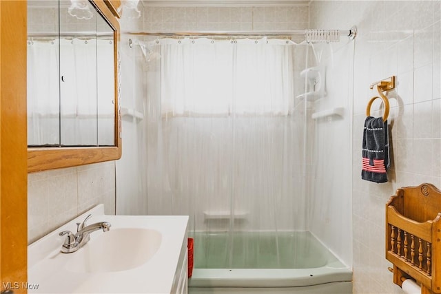 304 Conger Rd, Washington, WV 26181 - full bath with shower / bath combination, vanity, and tile walls