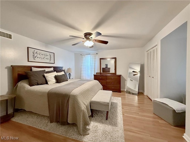 21 Ashwood Dr, Vienna, WV 26105 - bedroom with light wood finished floors and a ceiling fan